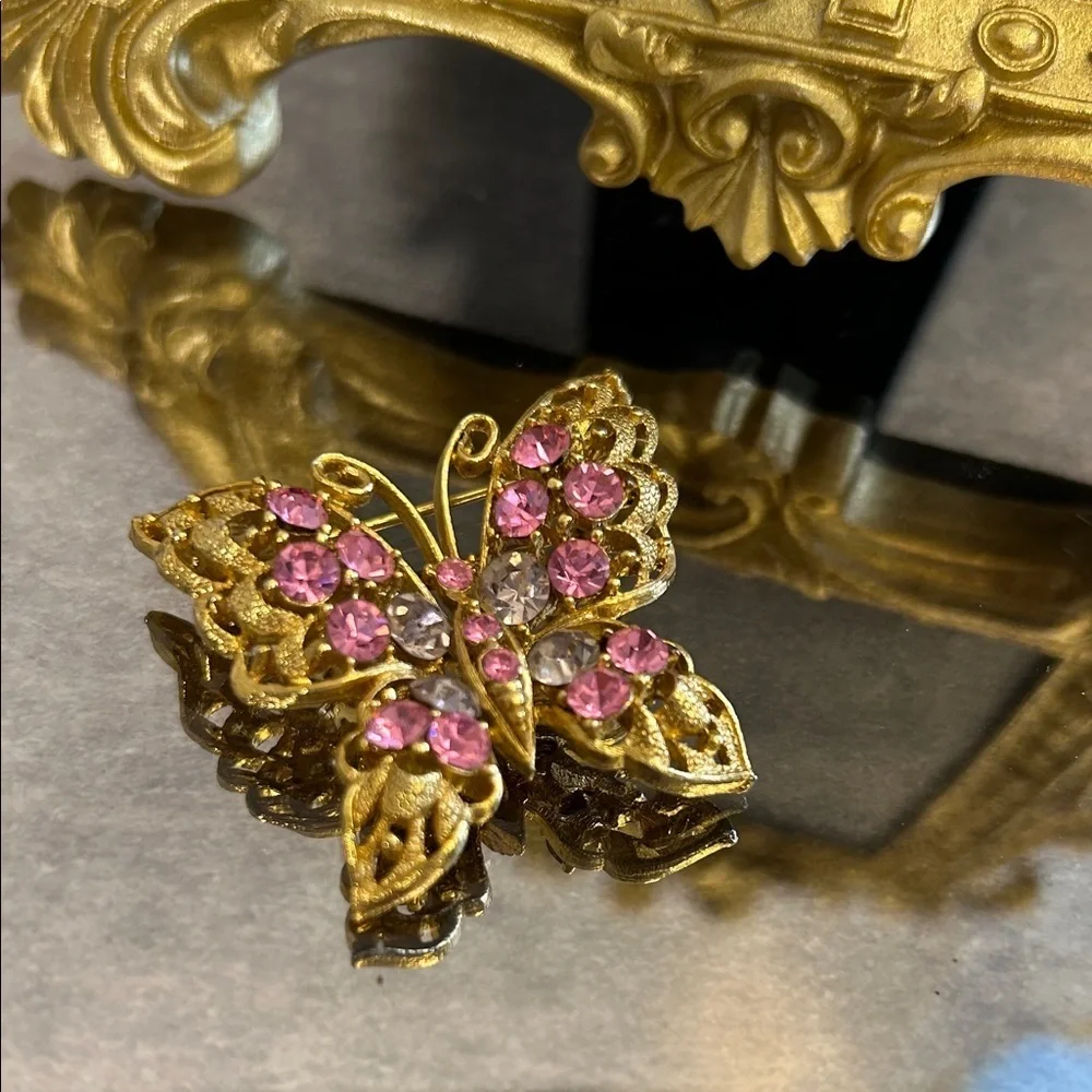 Elegant Gold Butterfly Brooch with Pink Accents